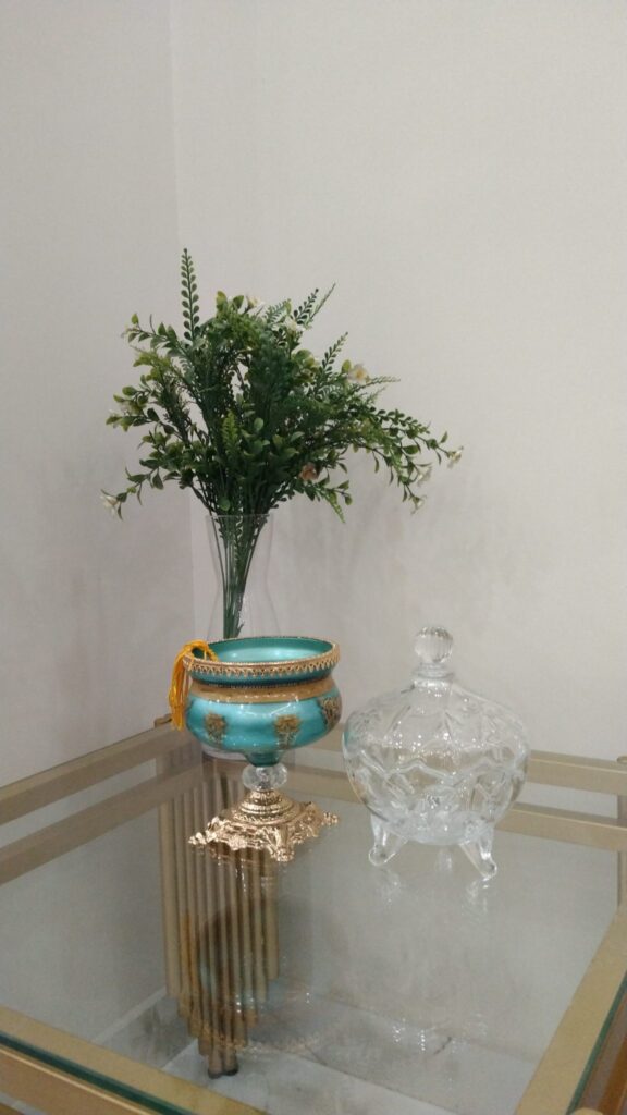 Small Glass Vase with Green Foliage
